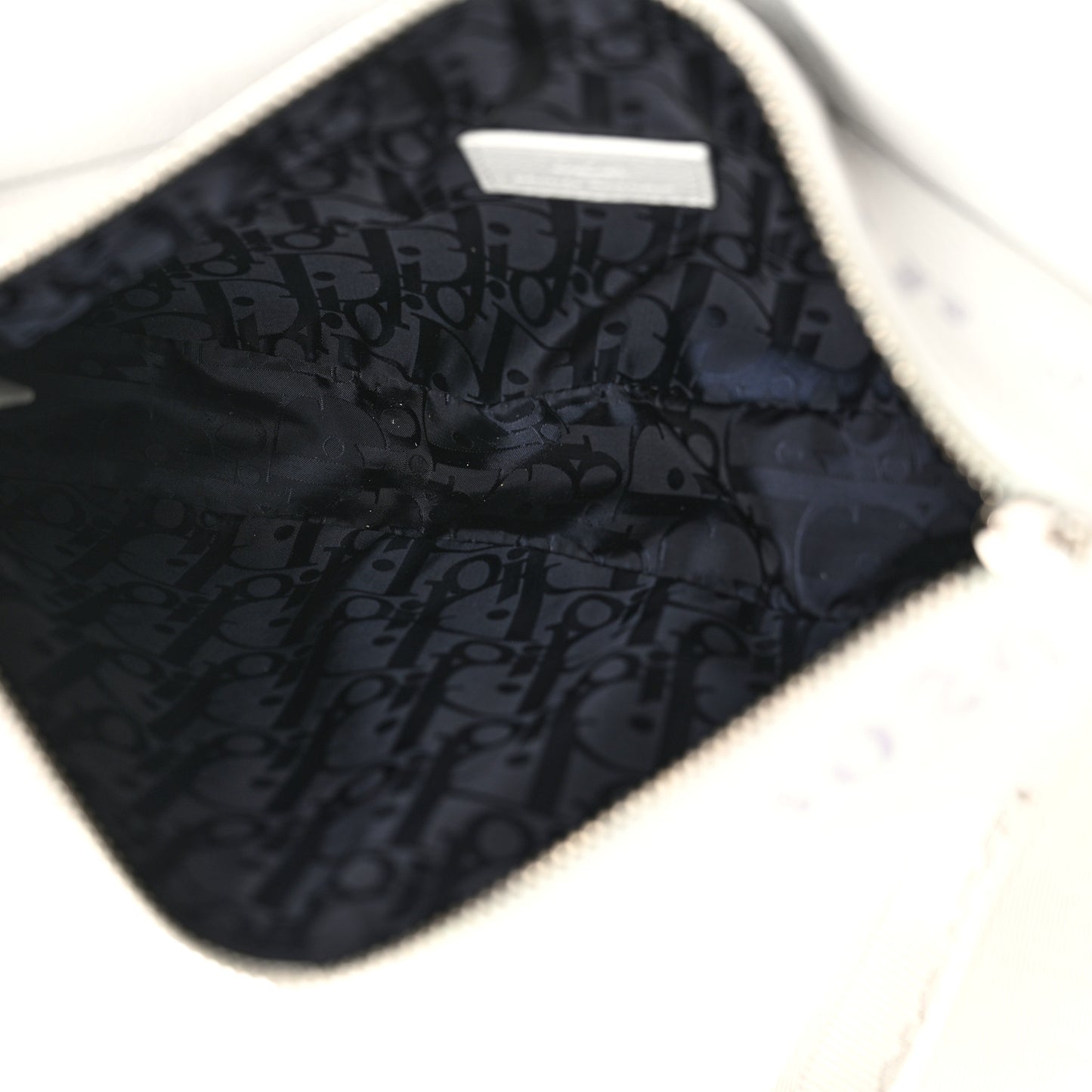 X DANIEL ARSHAM Grained Calfskin Newspaper Print Saddle Bag White