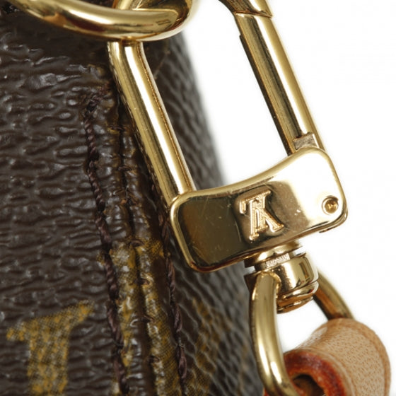 Monogram Mini Ellipse Wristlet Clutch