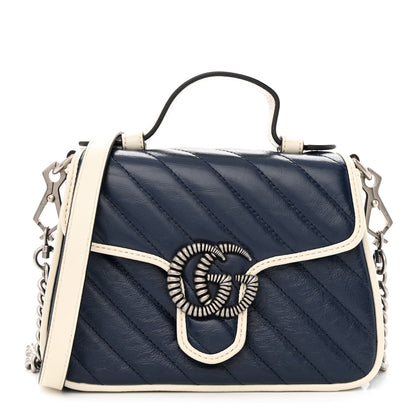 Gucci Vintage Effect Calfskin Matelasse Diagonal Mini Torchon GG Marmont Top Handle Shoulder Bag Blue Agata Mystic White 1 of 10