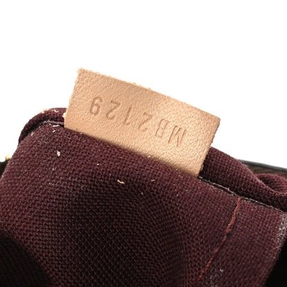 Louis Vuitton Monogram Rivoli PM 7 of 10