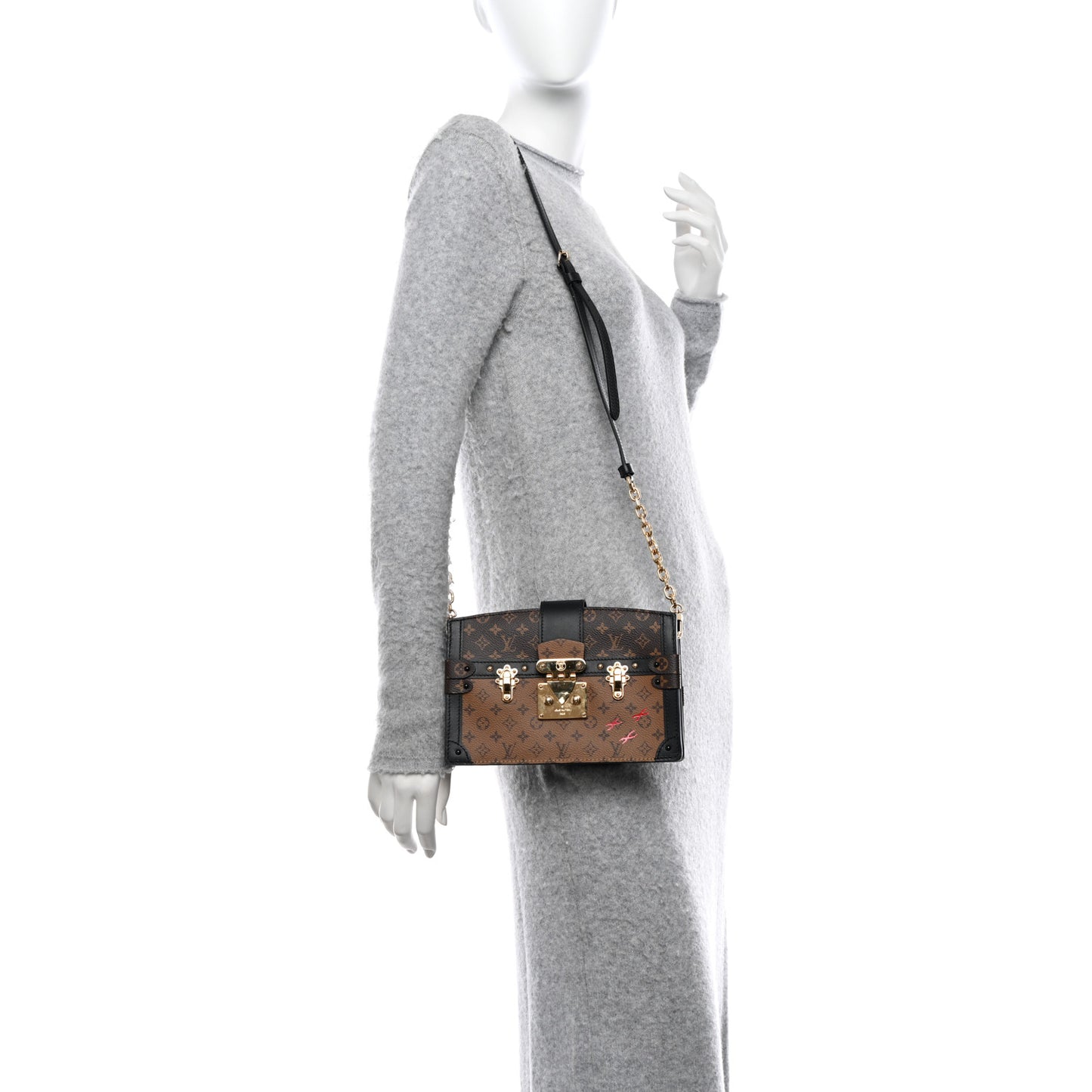 Reverse Monogram Trunk Clutch