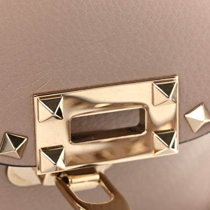 Valentino Garavani Pebbled Calfskin Medium Rockstud Flip Lock Crossbody Bag Poudre 12 of 12