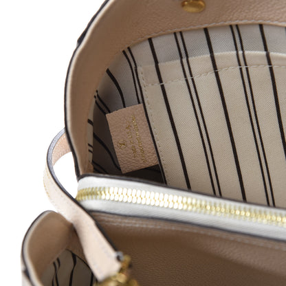 Louis Vuitton Empreinte Montaigne MM Neige 7 of 10