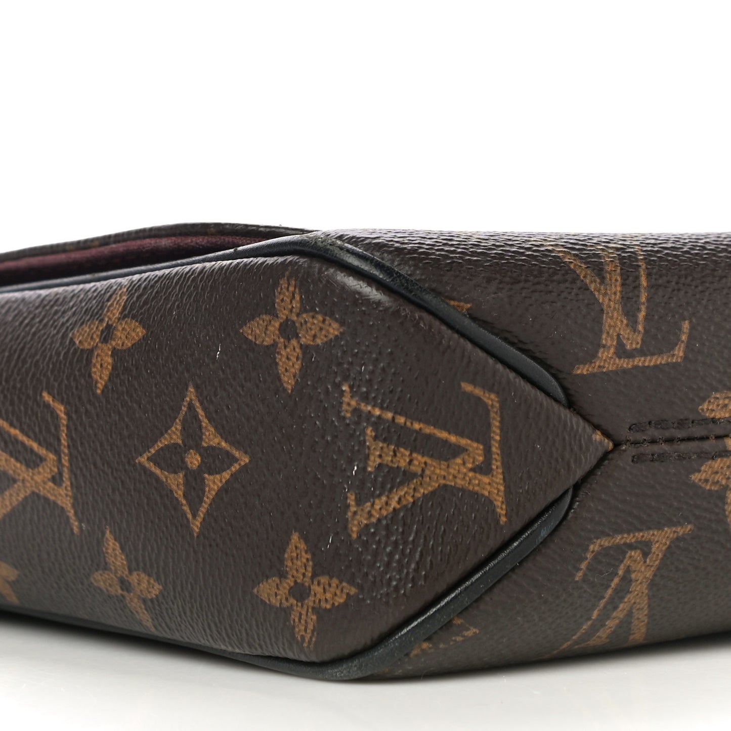 Monogram Macassar District PM