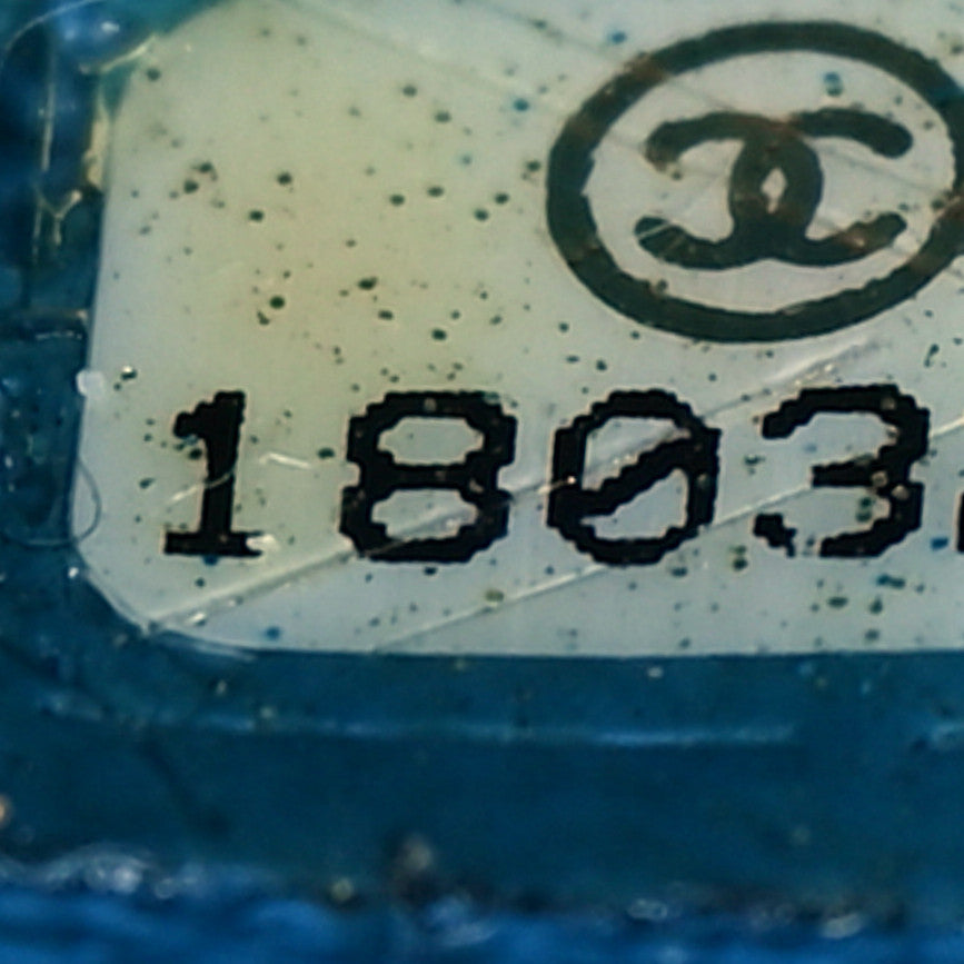 Iridescent Caviar Quilted Clutch With Chain Flap Blue