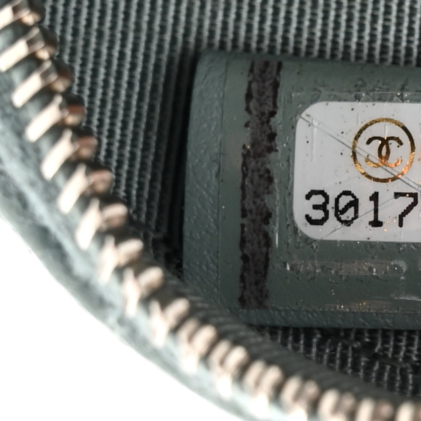 Caviar Quilted Round Clutch With Chain Light Blue