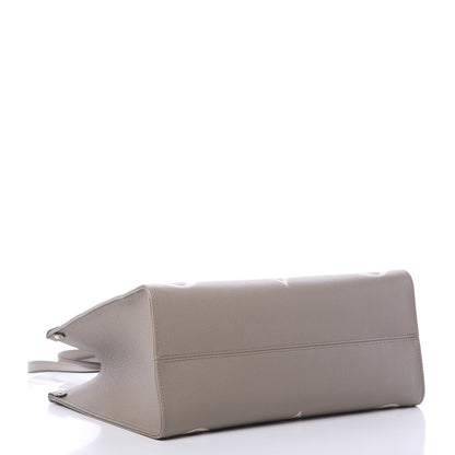 Louis Vuitton Empreinte Monogram Giant Onthego MM Tourterelle Creme 3 of 9