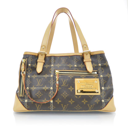 Louis Vuitton Monogram Riveting 1 of 11