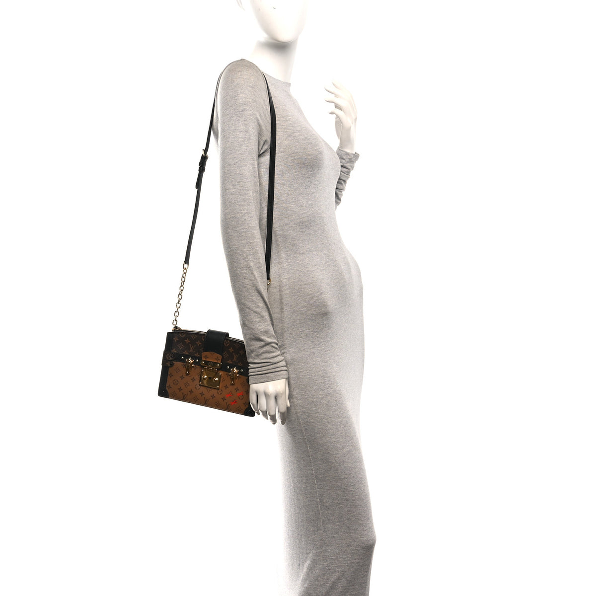 Reverse Monogram Trunk Clutch