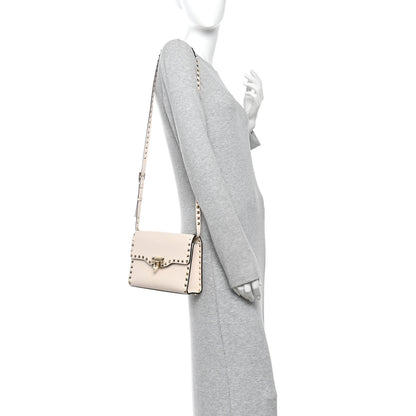 Valentino Garavani Pebbled Calfskin Medium Rockstud Flip Lock Crossbody Bag  Light Ivory 2 of 10