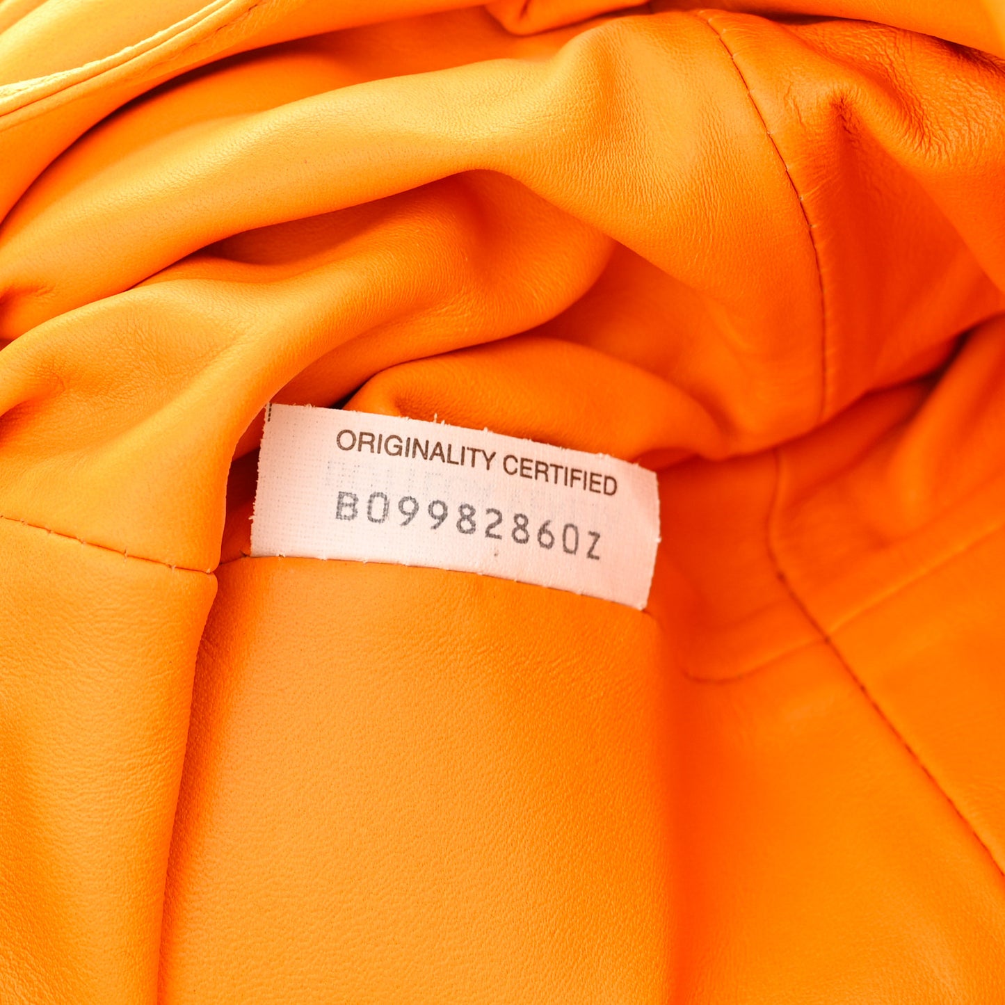 Butter Calfskin The Mini Pouch Tangerine