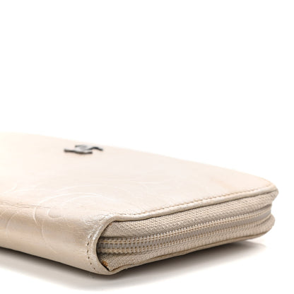 Chanel Lambskin Camellia Embossed Zip Around Organizer Wallet Light Beige 10 of 23