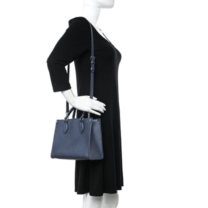 Louis Vuitton Metallic Empreinte Monogram Giant Onthego PM Navy Nacre 2 of 9