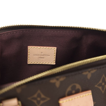 Louis Vuitton Monogram Rivoli MM 6 of 9