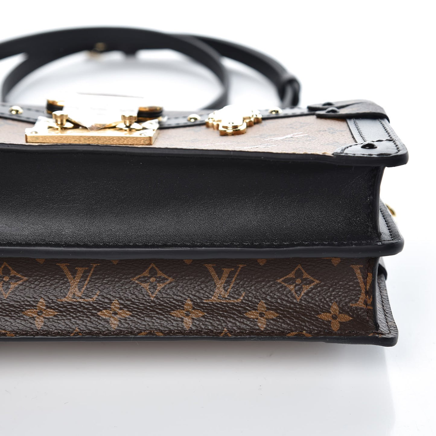 Reverse Monogram Trunk Clutch