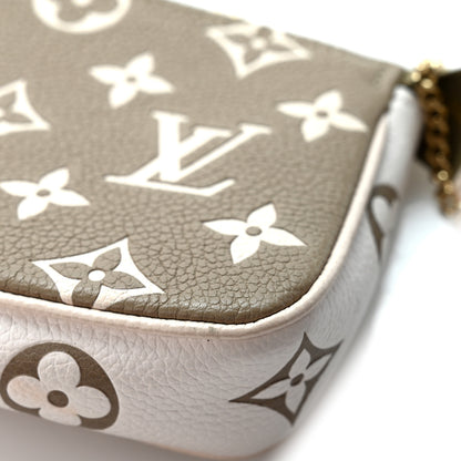 Louis Vuitton Empreinte Spring in the City Mini Pochette Accessories Kaki Beige Cream 8 of 8