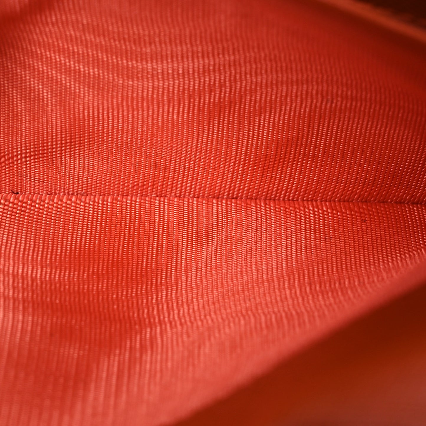 Tessuto Impuntu Triangle Continental Flap Wallet Orange