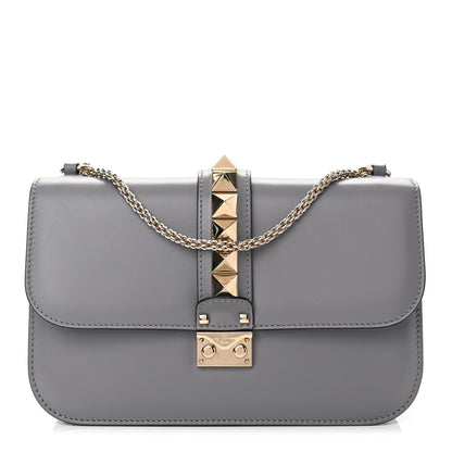 Valentino Garavani Vitello Medium Glam Lock Rockstud Flap London Stone 1 of 8