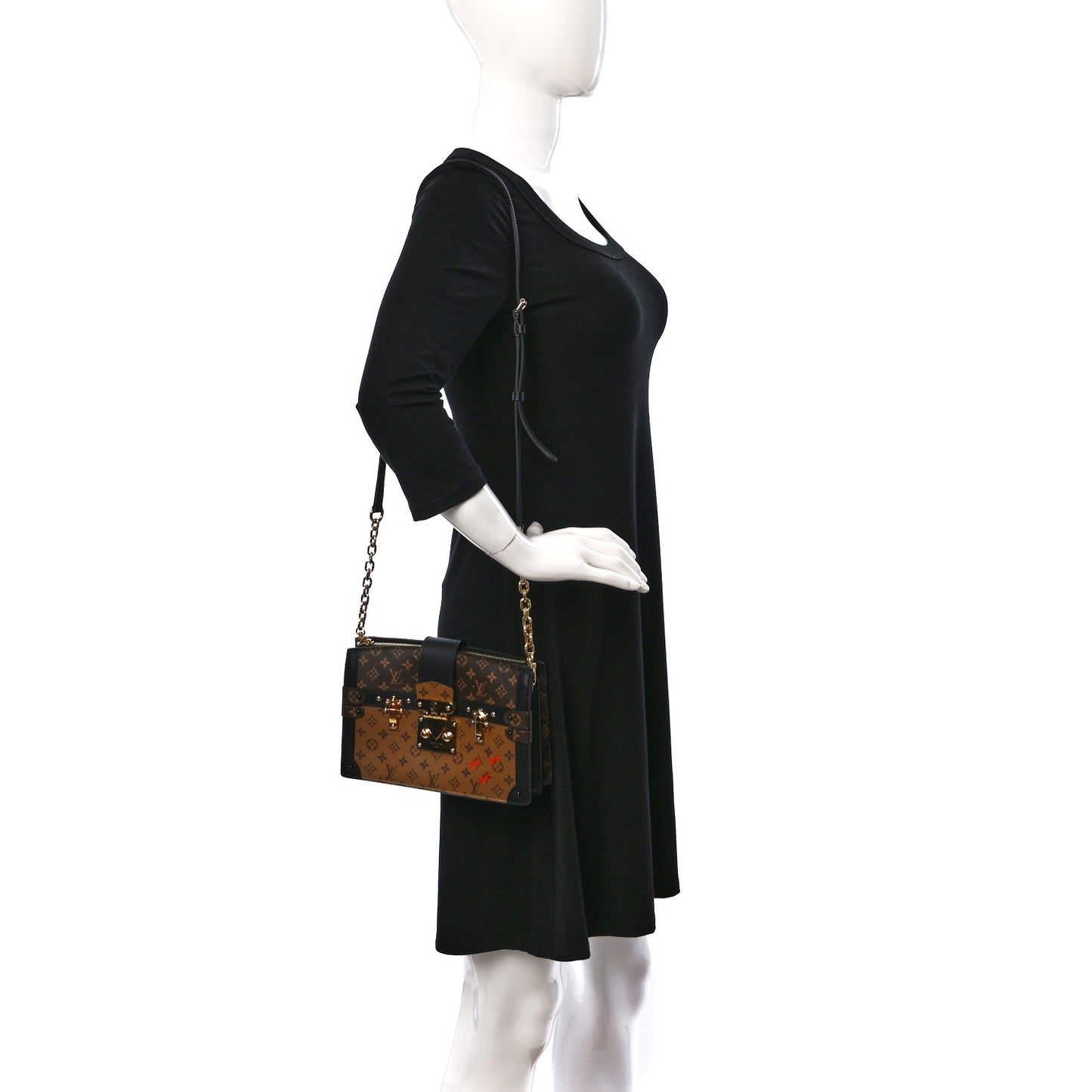 Reverse Monogram Trunk Clutch