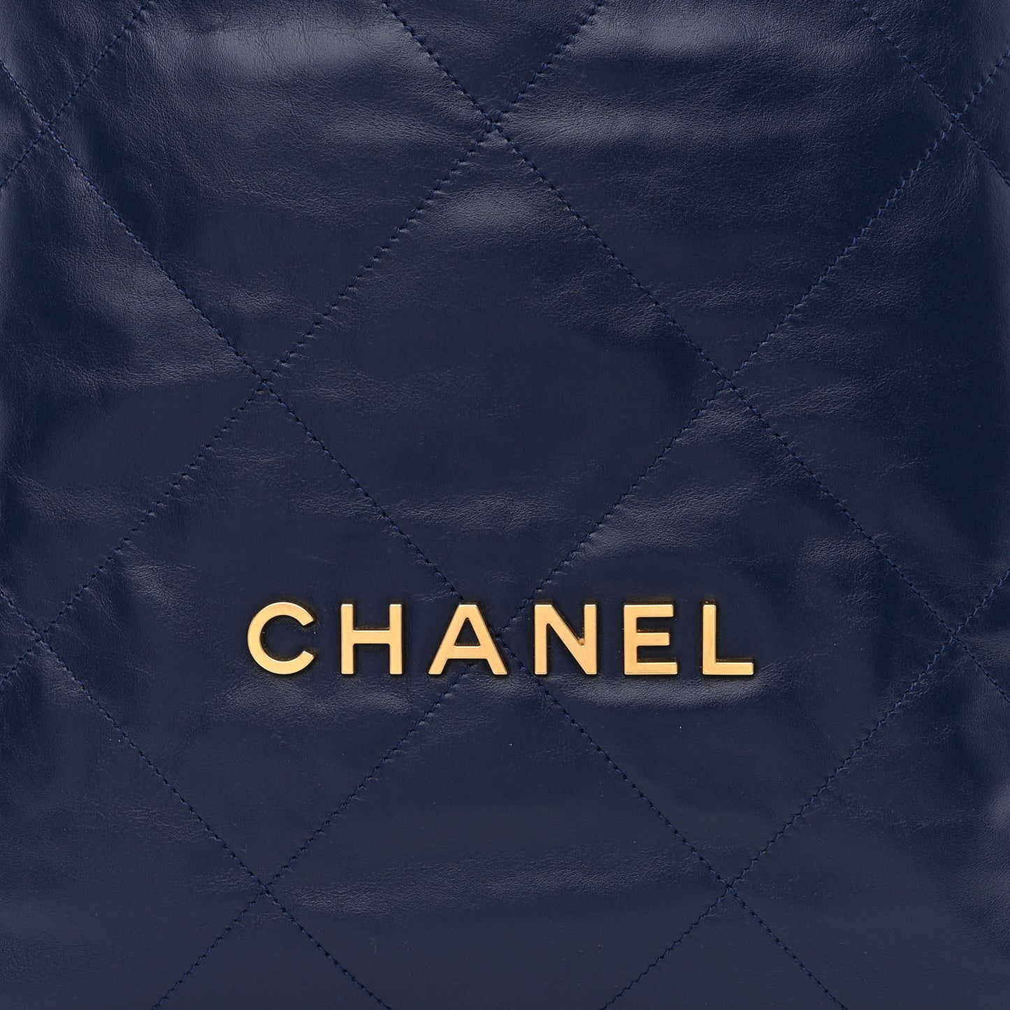 Shiny Calfskin Quilted Chanel 22 Backpack Navy