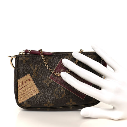 Louis Vuitton Monogram Trunks and Bags Mini Pochette 2 of 10