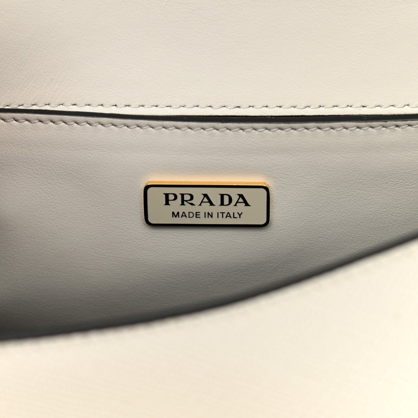 Saffiano Cuir Triangle Embleme Flap Shoulder Bag White