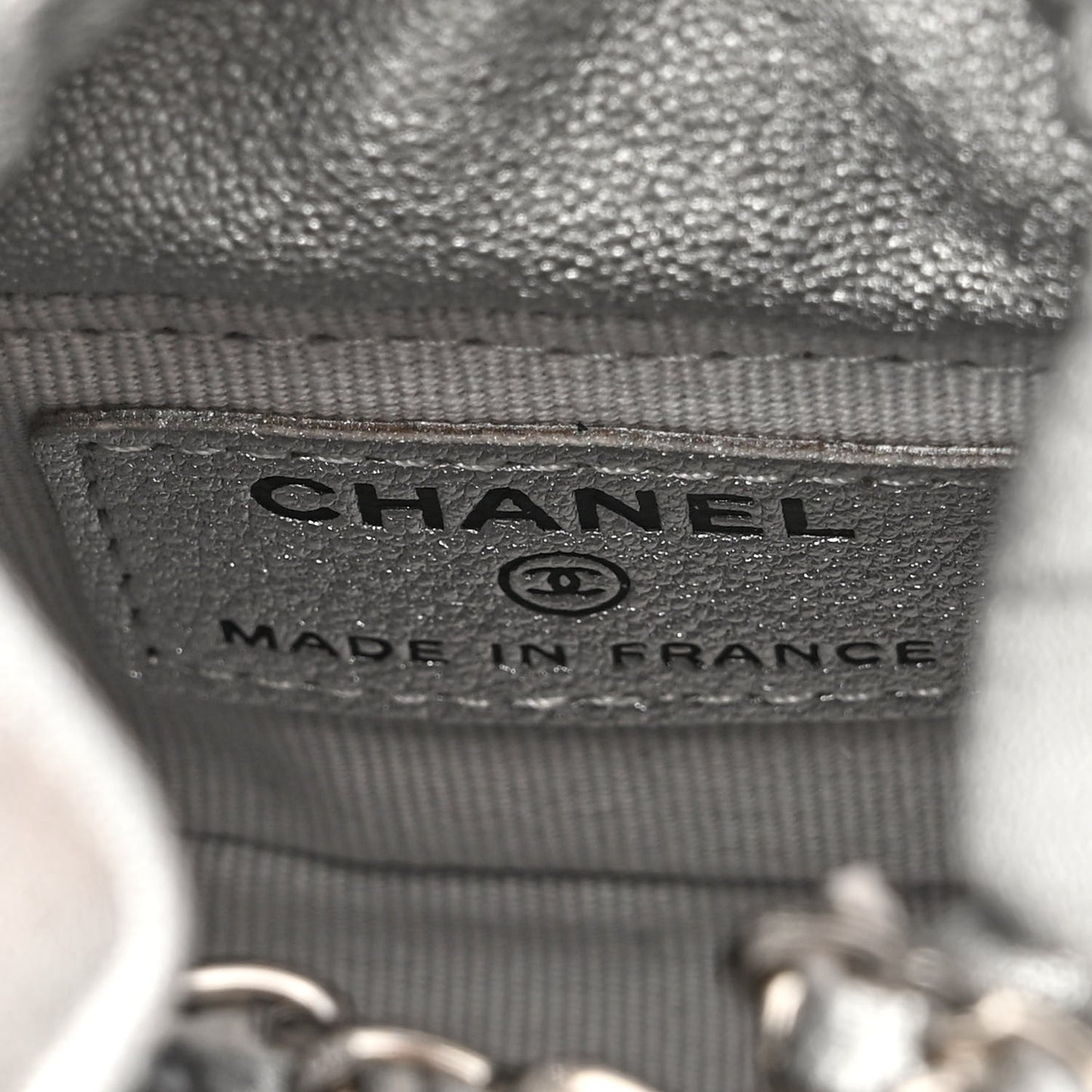 Metallic Caviar Quilted Mini Drawstring Bucket Bag Silver