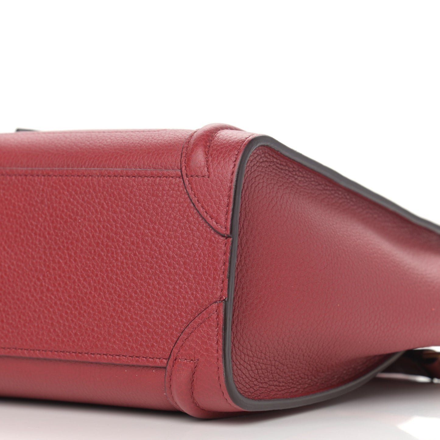 Drummed Calfskin Nano Luggage Ruby