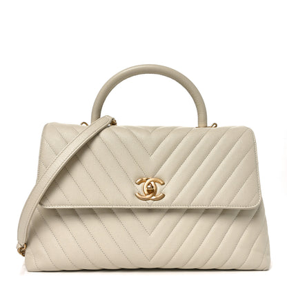 Chanel Caviar Chevron Quilted Medium Coco Handle Flap White 1 of 9