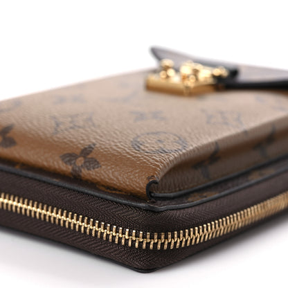 Louis Vuitton Reverse Monogram Metis Vertical Zippy Wallet 9 of 9