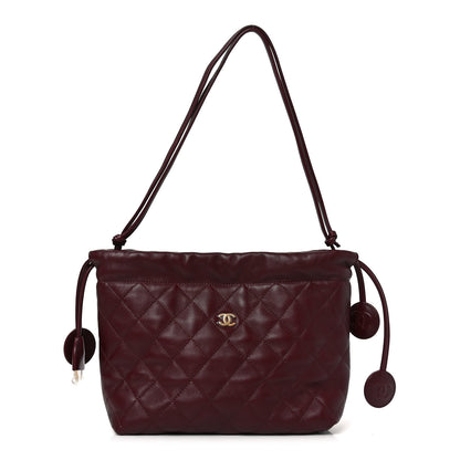 Chanel Lambskin Quilted Drawstring Clutch With Strap Dark Burgundy 1 of 9