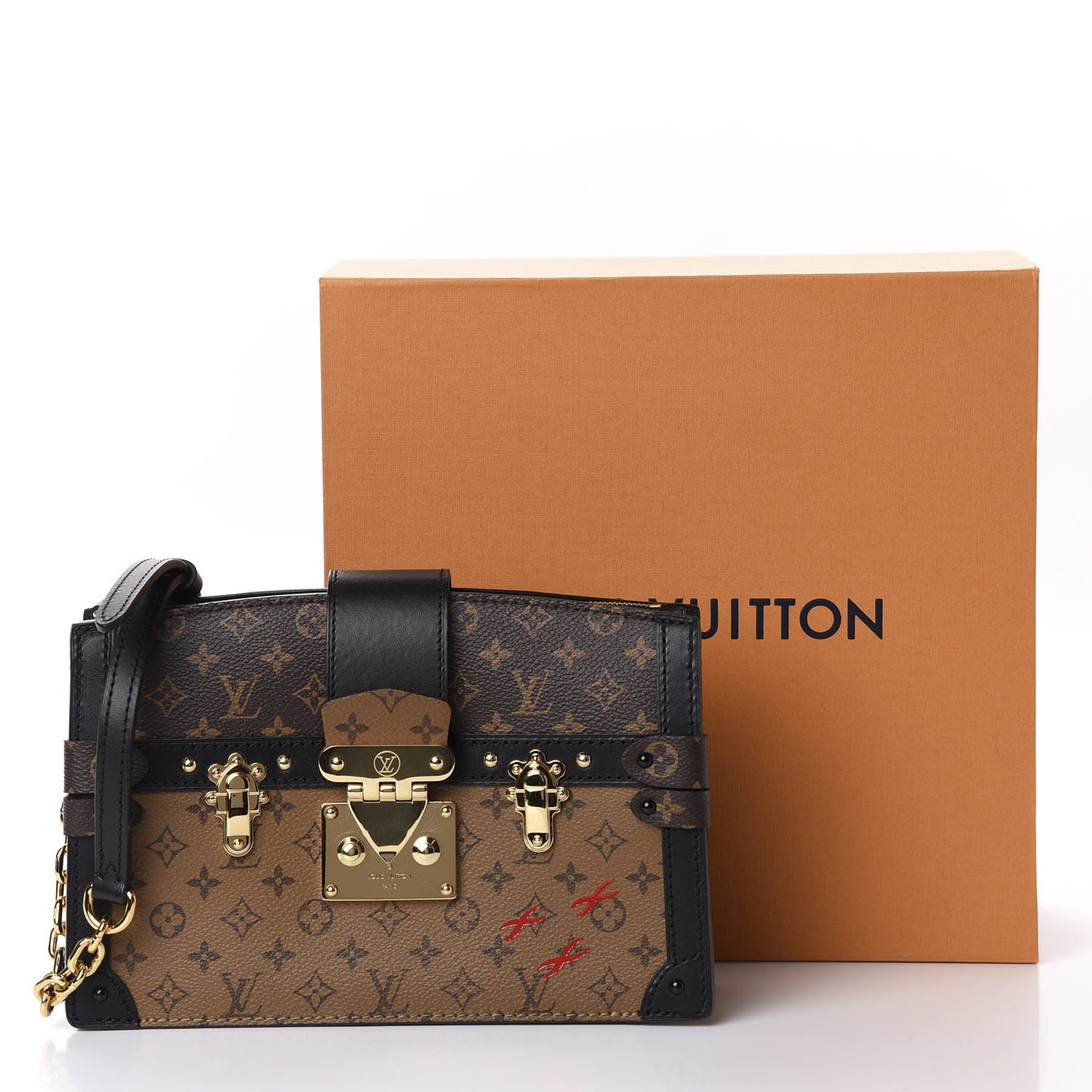 Reverse Monogram Trunk Clutch