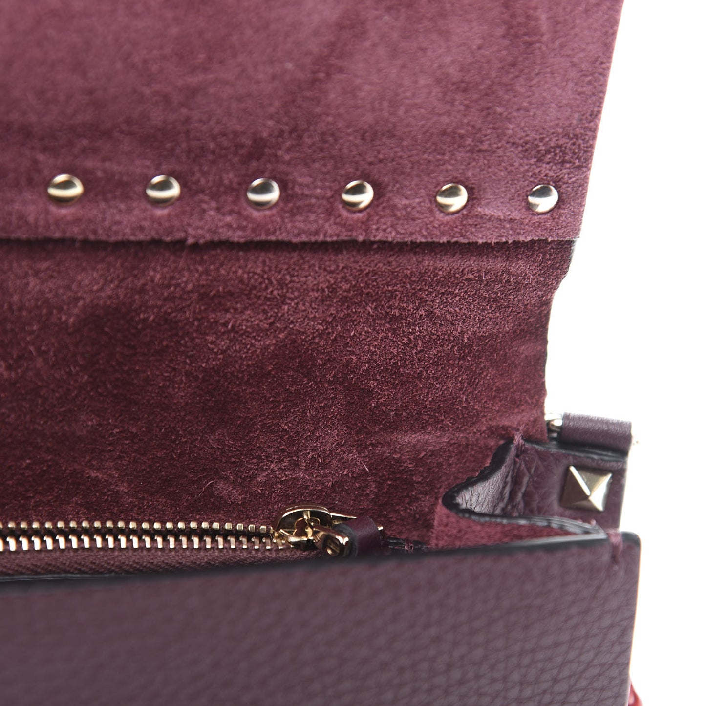 Pebbled Calfskin Rockstud Side Slip Crossbody Rubin