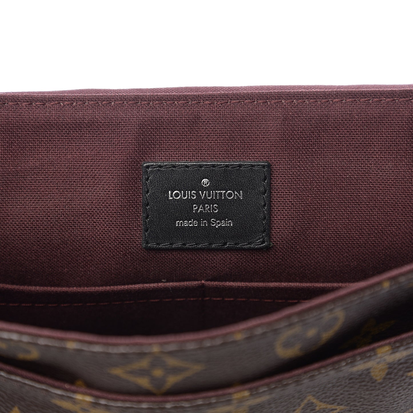 Monogram Macassar District PM