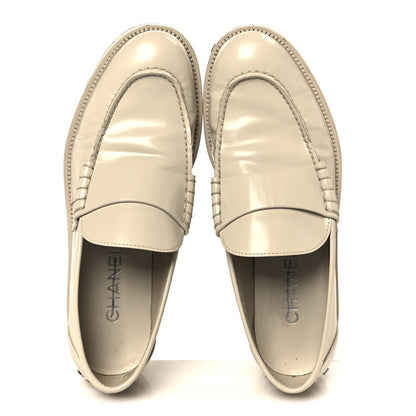 Chanel Shiny Calfskin Logo Loafers 38.5 Beige 2 of 11