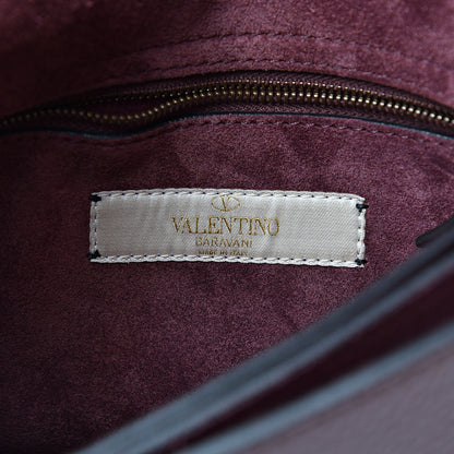 Valentino Garavani Pebbled Calfskin Rockstud Rolling Wristlet Clutch Rubin 6 of 11