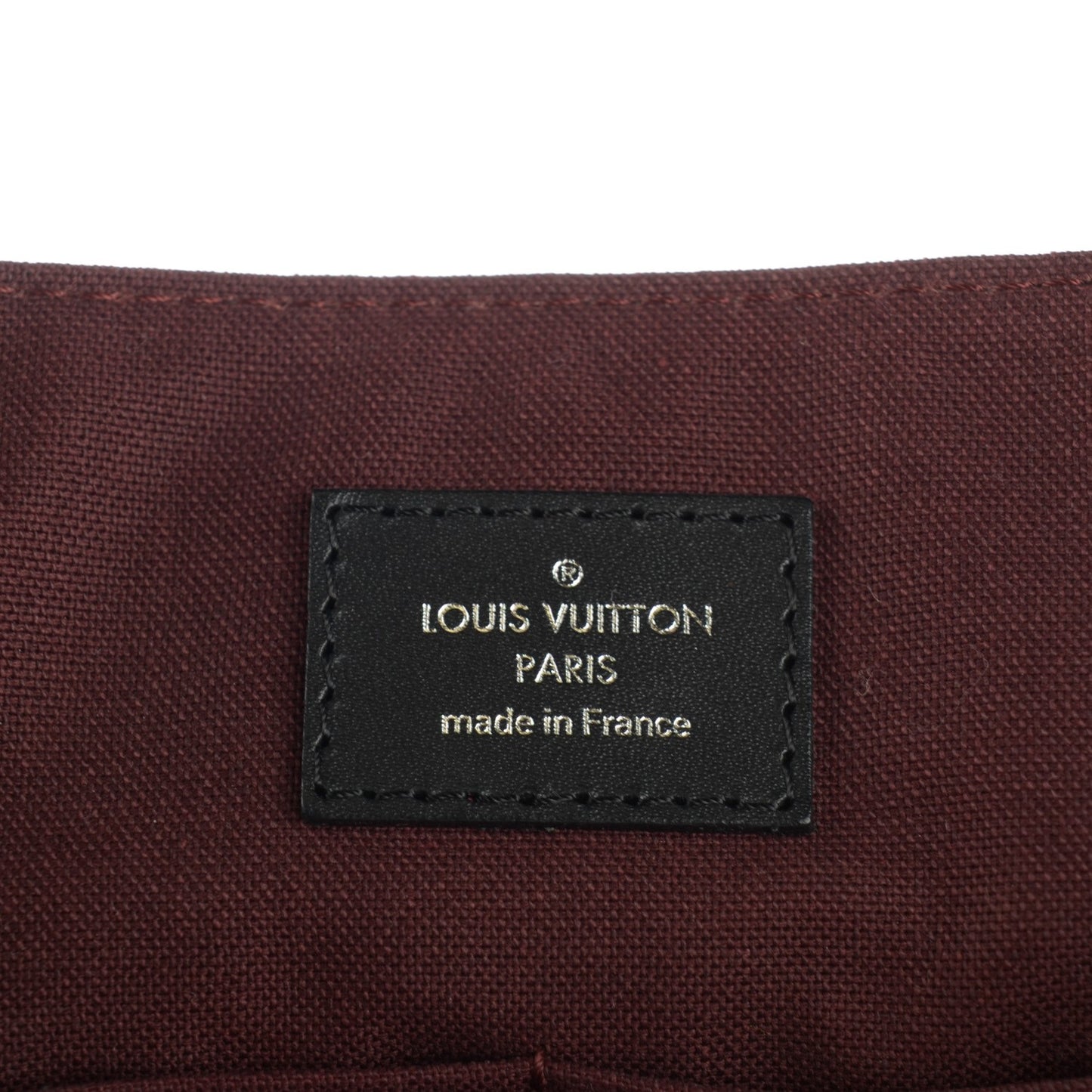 Monogram Macassar District MM