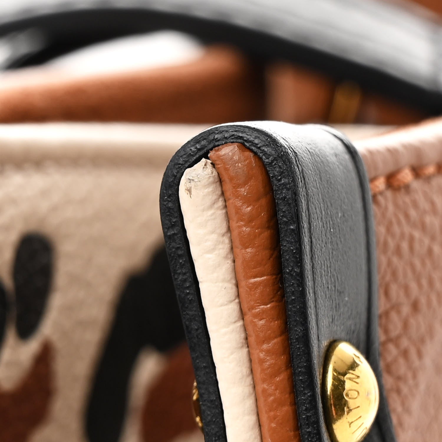 Louis Vuitton Empreinte Monogram Giant Wild At Heart Onthego MM Caramel 11 of 11