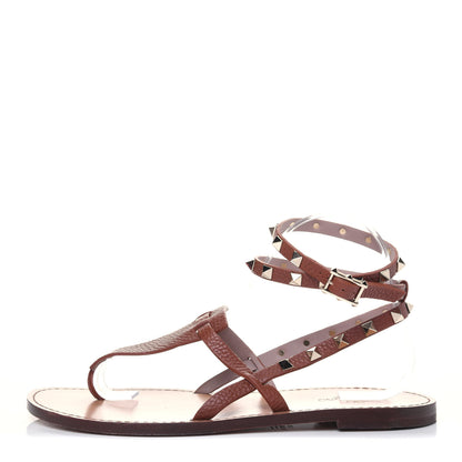 Valentino Garavani Pebbled Calfskin Rockstud Ankle Wrap Flat Thong Sandals 39 Bright Cognac 1 of 13