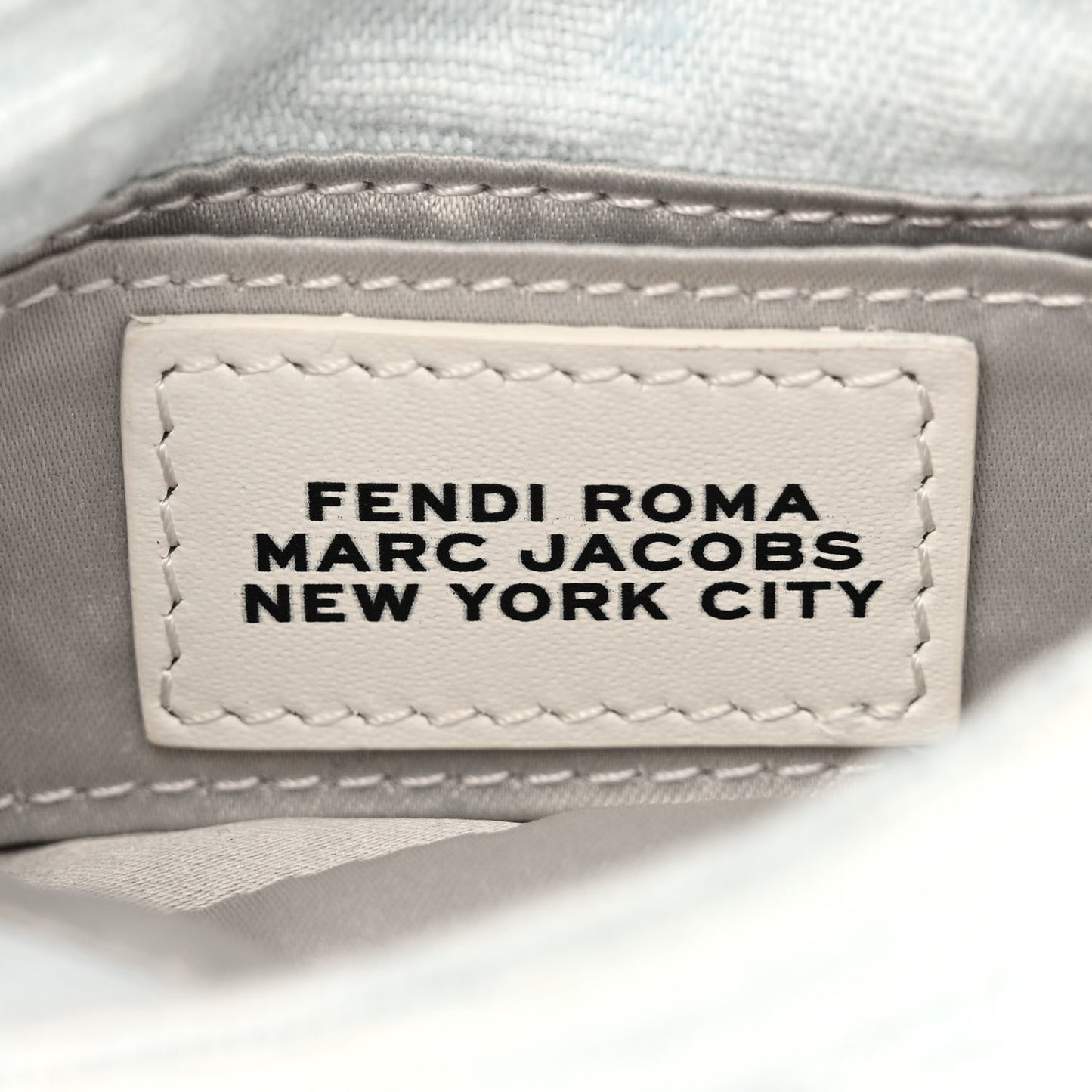 X MARC JACOBS Bleached Denim Logo Baguette Charm Off White