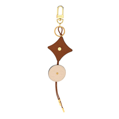 Louis Vuitton Taurillon Portocre Flower Tassel Bag Charm Key Holder Brown 1 of 4