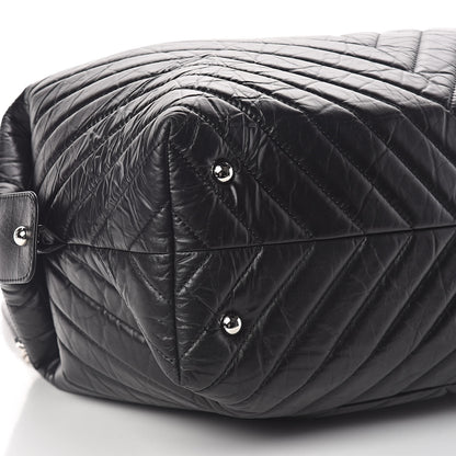 Chanel Aged Calfskin Chevron Quilted Duffle Bag Black 9 of 10