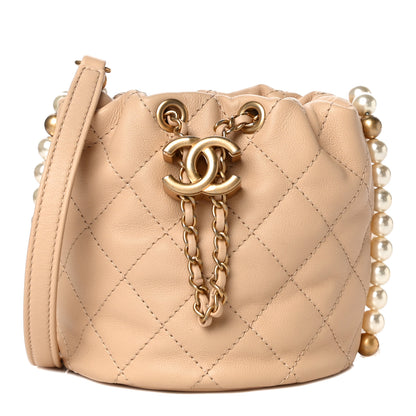Chanel Calfskin Quilted Pearl Mini About Pearls Drawstring Bucket Bag Beige 1 of 10