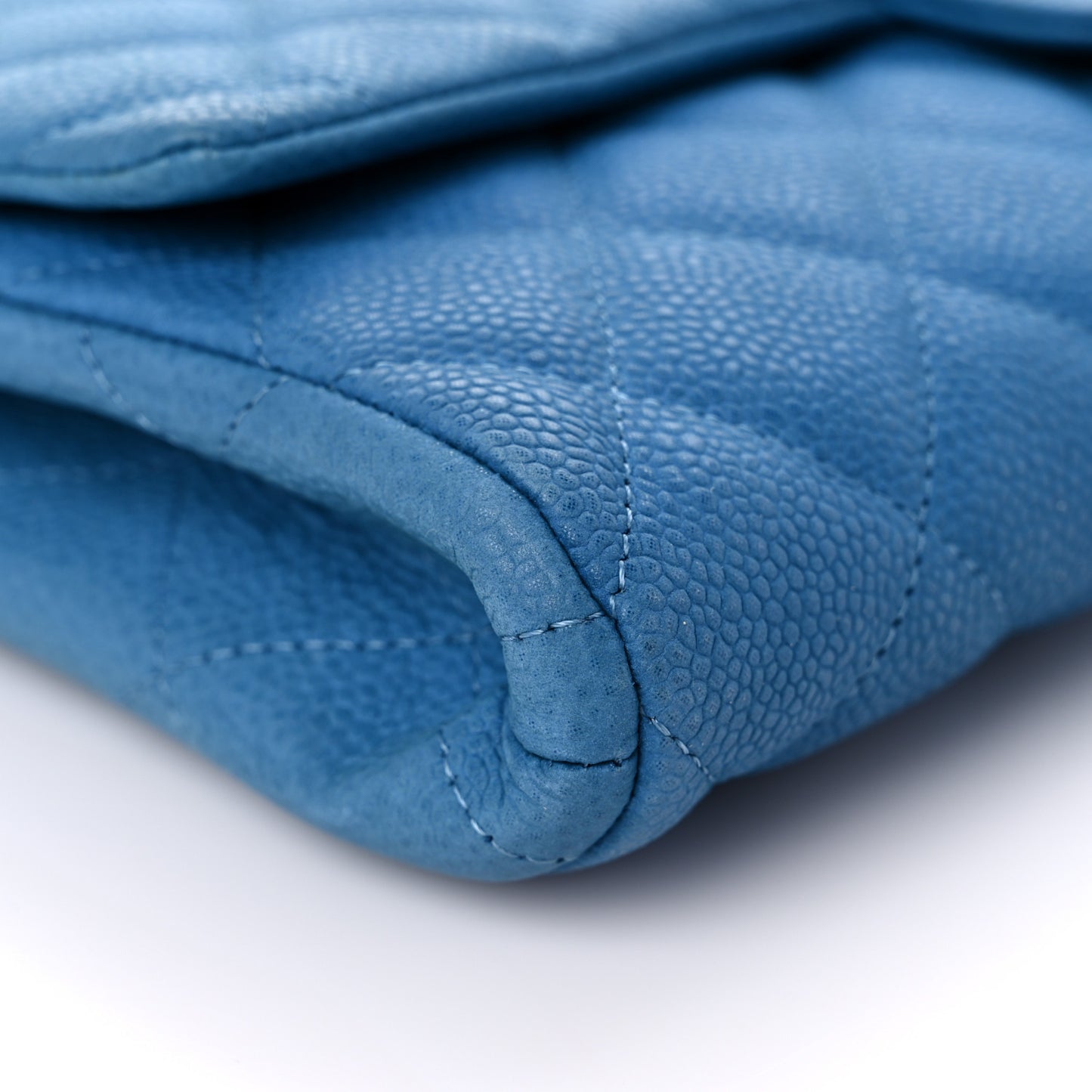 Iridescent Caviar Quilted Clutch With Chain Flap Blue