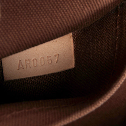 Louis Vuitton Monogram Riveting 8 of 8