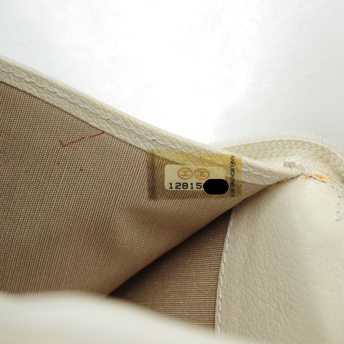 Goatskin Camellia Embossed Zip Around Wallet White