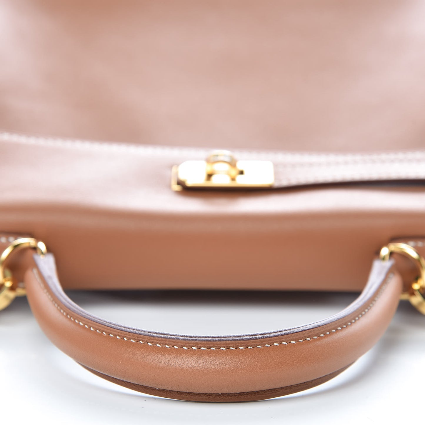 Swift Kelly Retourne 25 Gold