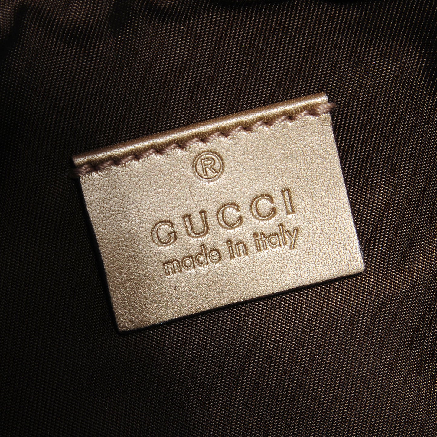 Guccissima New Britt Wristlet Gold