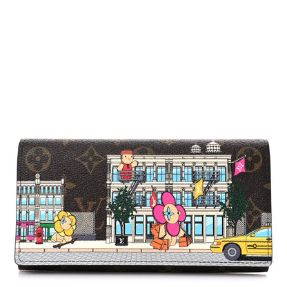 Louis Vuitton Monogram 2022 Christmas Animation Sarah Wallet Yellow 1 of 8