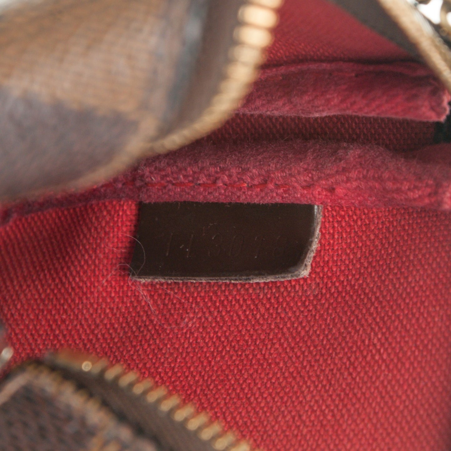 Damier Ebene Mini Pochette